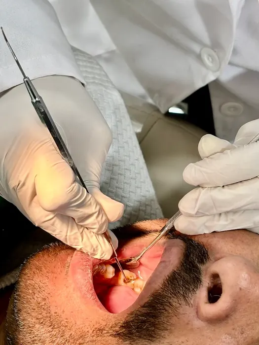 Close-up of careful clinical work