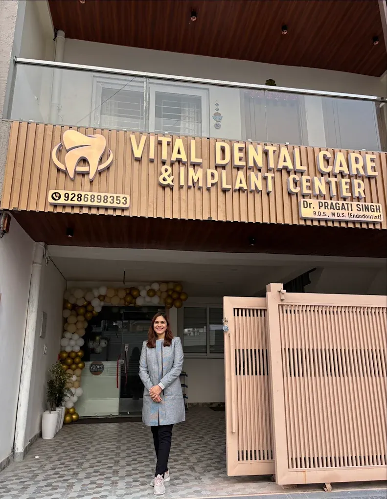 Dr. Pragati Singh outside Vital Dental Care and Implant Center on GMS Road, Dehradun